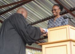 Dr. Phiri presents a gift to Rev. Masemene